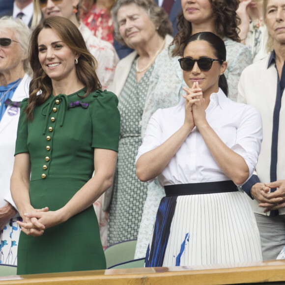 Catherine (Kate) Middleton, duchesse de Cambridge, Meghan Markle, duchesse de Sussex, et Pippa Middleton dans les tribunes lors de la finale femme de Wimbledon "Serena Williams - Simona Halep (2/6 - 2/6) à Londres, le 13 juillet 2019. © Ray Tang/London