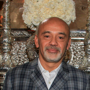 Christian Louboutin, Pierre Niney et sa compagne Natasha Andrews lors du vernissage de l'exposition consacrée à l'oeuvre et l'imaginaire de Christian Louboutin "l'Exhibitionniste' (L'Exibition[niste]) au Palais de la Porte Dorée, à Paris, France, le 24 février 2020. © Philippe Baldini/Bestimage