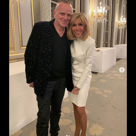 Maurizio Galante et Brigitte Macron lors du dîner offert par le président de la République et madame Brigitte Macron en l'honneur de la création et à l'occasion de la semaine de la mode, au palais de l'Élysée. Paris, le 24 février 2020.