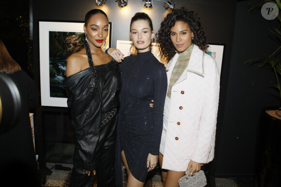 Jourdan Dunn, Ophélie Guillermand et Cindy Bruna lors de la vente aux enchères caritative à la soirée "Women for Women" aux Bains-Douches à Paris, France, le 27 février 2020, en marge de la semaine de la mode à Paris. La top model O.Guillermand et J.P.Marois, Propriétaire des Bains, ont réuni la mode en pleine fashion week pour une vente de charité au profit de Plan International France. Grâce aux généreuses donations de femmes photographes et avec le soutien gracieux de Maître A.Giquello, Président de Drouot Patrimoine,O.Guillermand a mis aux enchères une quinzaine de photographies de femmes prises par des femmes photographes au profit de programmes en faveur des droits des filles menés par l'ONG Plan International France. La soirée a permis de récolter 51 000 € grâce à la vente aux enchères de photographies signées par Ellen Von Unwerth, Sonia Sieff, Amanda Charchian, Ami Sioux, Anna Palma, Bibi Borthwick, Camilla Akrans, Carin Backoff, Carlotta Kohl, Charlotte Wales, Danielle Levitt, Emma Tempest, Maripol, Pamela Hanson, Posternak Tanya & Zhenya et Yulia Gorbachenko. © Veeren-Clovis/Bestimage