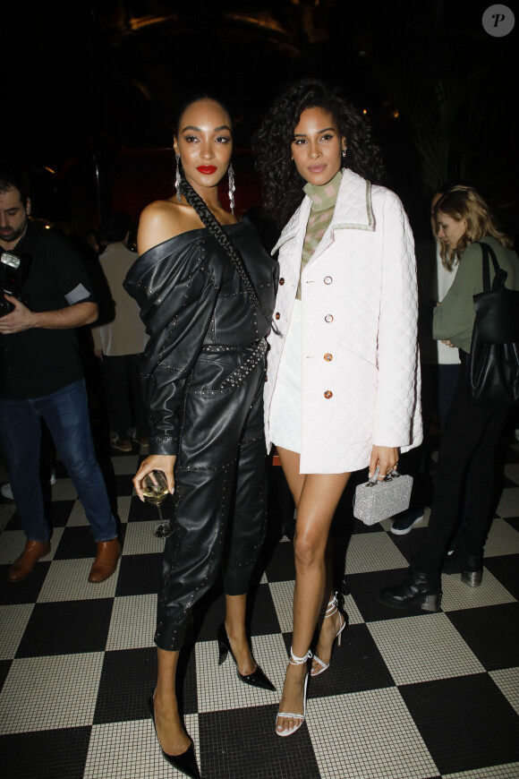 Jourdan Dunn et Cindy Bruna lors de la vente aux enchères caritative à la soirée "Women for Women" aux Bains-Douches à Paris, France, le 27 février 2020, en marge de la semaine de la mode à Paris. La top model O.Guillermand et J.P.Marois, Propriétaire des Bains, ont réuni la mode en pleine fashion week pour une vente de charité au profit de Plan International France. Grâce aux généreuses donations de femmes photographes et avec le soutien gracieux de Maître A.Giquello, Président de Drouot Patrimoine,O.Guillermand a mis aux enchères une quinzaine de photographies de femmes prises par des femmes photographes au profit de programmes en faveur des droits des filles menés par l'ONG Plan International France. La soirée a permis de récolter 51 000 € grâce à la vente aux enchères de photographies signées par Ellen Von Unwerth, Sonia Sieff, Amanda Charchian, Ami Sioux, Anna Palma, Bibi Borthwick, Camilla Akrans, Carin Backoff, Carlotta Kohl, Charlotte Wales, Danielle Levitt, Emma Tempest, Maripol, Pamela Hanson, Posternak Tanya & Zhenya et Yulia Gorbachenko. © Veeren-Clovis/Bestimage