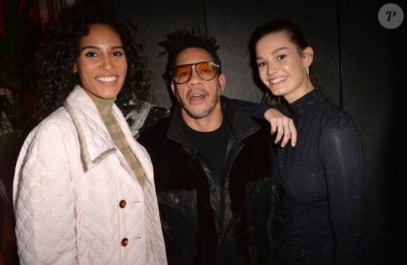 Cindy Bruna, JoeyStarr (Joey Starr) et Ophélie Guillermand lors de la vente aux enchères caritative à la soirée "Women for Women" aux Bains-Douches à Paris, France, le 27 février 2020, en marge de la semaine de la mode à Paris. La top model O.Guillermand et J.P.Marois, Propriétaire des Bains, ont réuni la mode en pleine fashion week pour une vente de charité au profit de Plan International France. Grâce aux généreuses donations de femmes photographes et avec le soutien gracieux de Maître A.Giquello, Président de Drouot Patrimoine,O.Guillermand a mis aux enchères une quinzaine de photographies de femmes prises par des femmes photographes au profit de programmes en faveur des droits des filles menés par l'ONG Plan International France. La soirée a permis de récolter 51 000 € grâce à la vente aux enchères de photographies signées par Ellen Von Unwerth, Sonia Sieff, Amanda Charchian, Ami Sioux, Anna Palma, Bibi Borthwick, Camilla Akrans, Carin Backoff, Carlotta Kohl, Charlotte Wales, Danielle Levitt, Emma Tempest, Maripol, Pamela Hanson, Posternak Tanya & Zhenya et Yulia Gorbachenko. © Veeren-Clovis/Bestimage