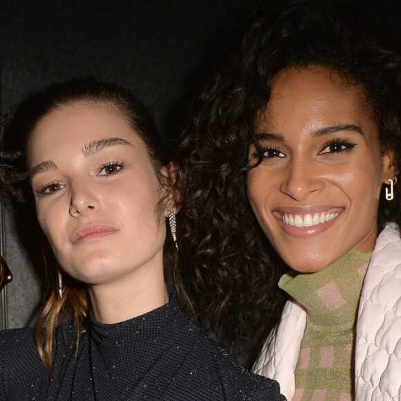 Joey Starr, Ophélie Guillermand et Cindy Bruna lors de la vente aux enchères caritative à la soirée "Women for Women" aux Bains-Douches à Paris, France, le 27 février 2020, en marge de la semaine de la mode à Paris. La top model O.Guillermand et J.P.Marois, Propriétaire des Bains, ont réuni la mode en pleine fashion week pour une vente de charité au profit de Plan International France. Grâce aux généreuses donations de femmes photographes et avec le soutien gracieux de Maître A.Giquello, Président de Drouot Patrimoine,O.Guillermand a mis aux enchères une quinzaine de photographies de femmes prises par des femmes photographes au profit de programmes en faveur des droits des filles menés par l'ONG Plan International France. La soirée a permis de récolter 51 000 € grâce à la vente aux enchères de photographies signées par Ellen Von Unwerth, Sonia Sieff, Amanda Charchian, Ami Sioux, Anna Palma, Bibi Borthwick, Camilla Akrans, Carin Backoff, Carlotta Kohl, Charlotte Wales, Danielle Levitt, Emma Tempest, Maripol, Pamela Hanson, Posternak Tanya & Zhenya et Yulia Gorbachenko. © Veeren-Clovis/Bestimage