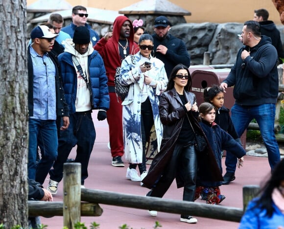 Travis Scott, Kourtney Kardashian, Penelope Disick, Corey Gamble, North West, Kylie Jenner - Exclusif - Les Kardashian passent la journée à Disney Magic Kingdom à Orlando en Floride, le 23 janvier 2020