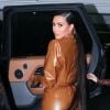 Exclusif - Kim et Kourtney Kardashian portent des vêtements en latex Balmain à leur retour à leur hôtel à Paris après le "Sunday Service" de Kanye West. Paris, le 1er mars 2020.