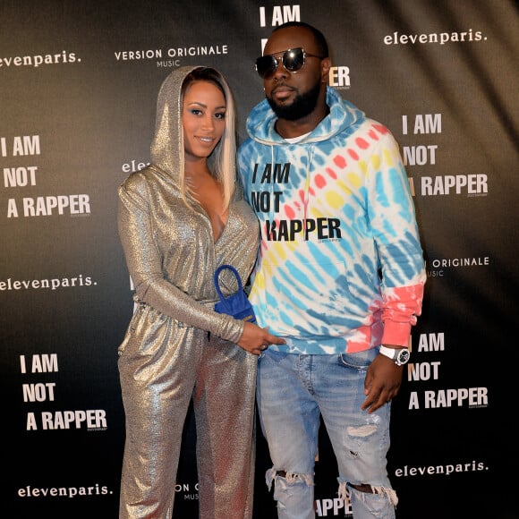 Le rappeur Gims (Maître Gims - Gandhi Djuna) et sa femme Demdem Djuna lors de la soirée de lancement de la collection capsule "I'm not a rapper" de la marque Elevenparis (Eleven Paris) à Paris, France, le 11 avril 2019. © Veeren/Bestimage