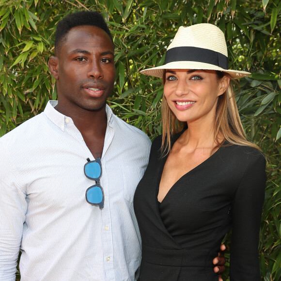 Ariane Brodier et son compagnon Fulgence Ouedraogo au village lors des internationaux de tennis de Roland Garros à Paris le 5 juin 2017. © Cyril Moreau / Dominique Jacovides / Bestimage