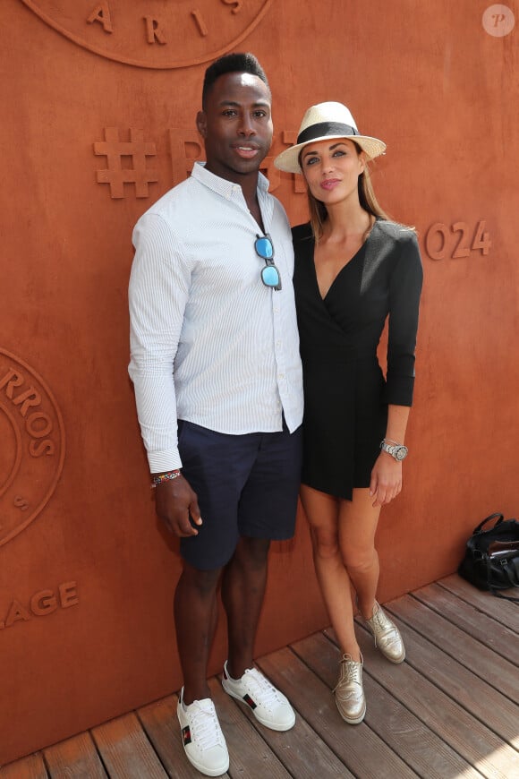 Ariane Brodier et son compagnon Fulgence Ouedraogo au village lors des internationaux de tennis de Roland Garros à Paris le 5 juin 2017. © Cyril Moreau / Dominique Jacovides / Bestimage