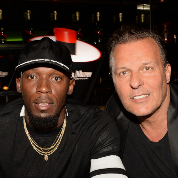 Exclusif - Le champion Usain Bolt et Jean Roch au restaurant La Gioia au VIP Room à Paris le 12 juin 2018. © Rachid Bellak / Bestimage