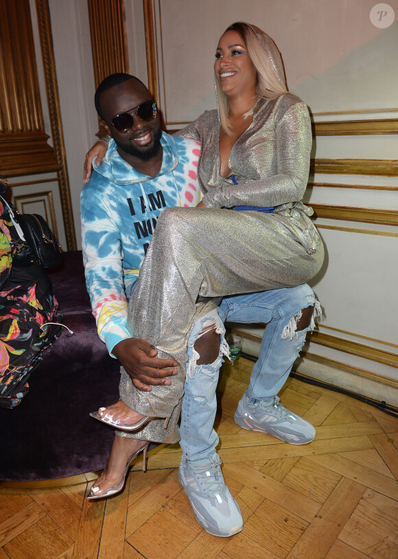 Le rappeur Gims (Maître Gims - Gandhi Djuna) et sa femme Demdem Djuna lors de la soirée de lancement de la collection capsule "I'm not a rapper" de la marque Elevenparis (Eleven Paris) à Paris, France, le 11 avril 2019. © Veeren/Bestimage