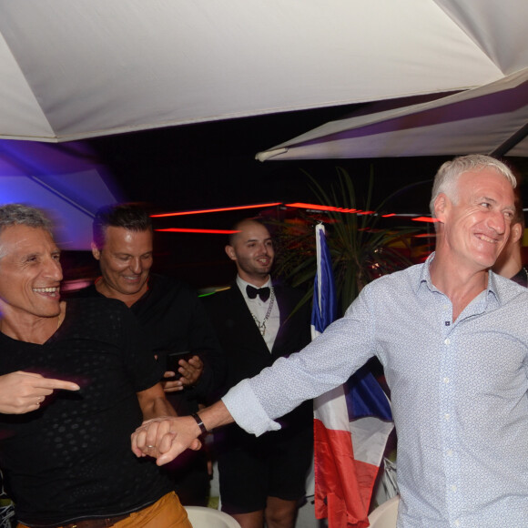 Didier Deschamps fête sa victoire avec sa femme Claude, Nagui et sa femme Mélanie Page et des amis à la Gioia et au VIP Room à Saint-Tropez, le 21 juillet 2018. © Rachid Bellak/Bestimage