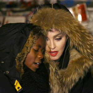 Exclusif - Madonna se recueille avec son fils David Banda sur la place de la République vers 1h00 du matin après son concert à l'AccorHotels Arena (Bercy) à Paris le 9 décembre 2015.