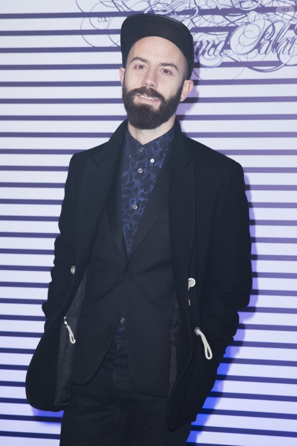Woodkid (Yoann Lemoine) - Photocall de la soirée de vernissage de l'exposition "Jean Paul Gaultier" au Grand Palais à Paris, le 30 mars 2015.