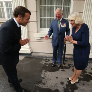 Le prince Charles, prince de Galles, et Camilla Parker Bowles, duchesse de Cornouailles accueillent le président de la République française Emmanuel Macron dans la maison royale Clarence House, pour la commémoration du 80ème anniversaire de l'appel du 18 juin du général de Gaulle à Londres, Royaume Uni, le 18 juin 2010.