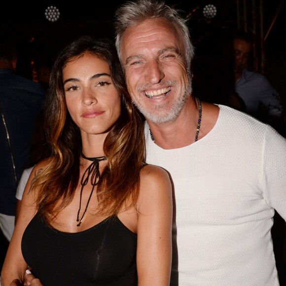 Exclusif - David Ginola et sa nouvelle et jeune compagne Maeva Denat - Soirée de la Summer Party des 50 ans du Byblos et des Caves du Roy à Saint-Tropez le 23 juillet 2017. © Rachid Bellak/Bestimage