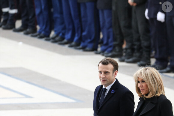 Le président Emmanuel Macron, la première dame Brigitte Macron lors de la cérémonie à l'occasion de la première journée nationale d'hommage aux victimes du terrorisme sur l'Esplanade du Trocadero à Paris le 11 mars 2020. © Stéphane Lemouton / Bestimage