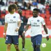 David Luiz et Serge Aurier - Match de Ligue 1 PSG-Metz - 2ème journée au Parc des Princes à Paris, le 21 août 2016. Victoire du PSG 3-0. © Pierre Perusseau/Bestimage