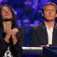 Exclusif - Jean-Luc Reichmann joue avec Xavier Mercier au profit de l'Association SOS Addictions - Enregistrement à l'occasion des 15 ans de l'émission "Qui veut gagner des millions ?" sur TF1 au studio Carrère A de La Plaine Saint-Denis. le 31 aout 2015.