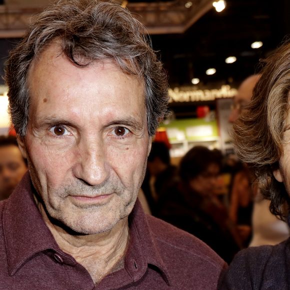 Jean-Jacques Bourdin et sa femme Anne Nivat - 38ème salon du livre de Paris à la Porte de Versailles, Paris le 17 mars 2018. © Cédric Perrin/Bestimage