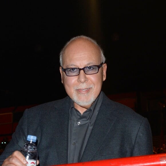 René Angélil et son fils René-Charles au concert de Céline Dion au POPB de Paris, le 5 décembre 2013.