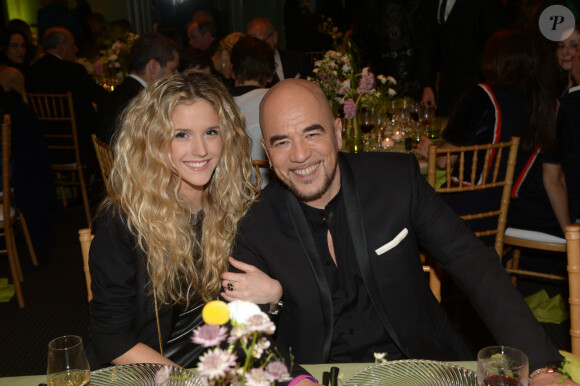 Pascal Obispo et sa compagne Julie Hantson - Dîner de la mode pour le Sidaction au pavillon d'Armenonville à Paris. Le 23 janvier 2014