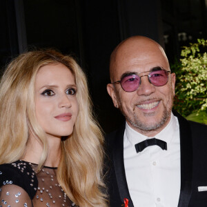 Pascal Obispo et sa femme Julie Hantson à la 17ème édition du "Dîner de la mode du Sidaction" au Pavillon d'Armenonville à Paris, France, le 24 janvier 2019. Depuis 2003, ce dîner permet de montrer l'engagement indéfectible du monde de la mode en faveur de la lutte contre le sida. © Rachid Bellak/Bestimage