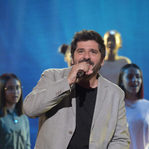 Exclusif - Patrick Fiori - Enregistrement de l'émission "300 Choeurs chantent Dassin" à Paris, qui sera diffusée le 16 octobre sur France 3. Le divertissement musical "300 Choeurs" fait sa rentrée avec une émission 100 % inédite consacrée à l'un des artistes les plus populaires dans les années 70, Joe Dassin. Toute la soirée, plusieurs générations d'artistes s'associeront aux plus beaux choeurs français pour reprendre à leurs côtés les plus grandes chansons de du chanteur dans des versions créées spécialement pour l'émission. Le 15 septembre 2020 © Tiziano Da Silva / Bestimage 