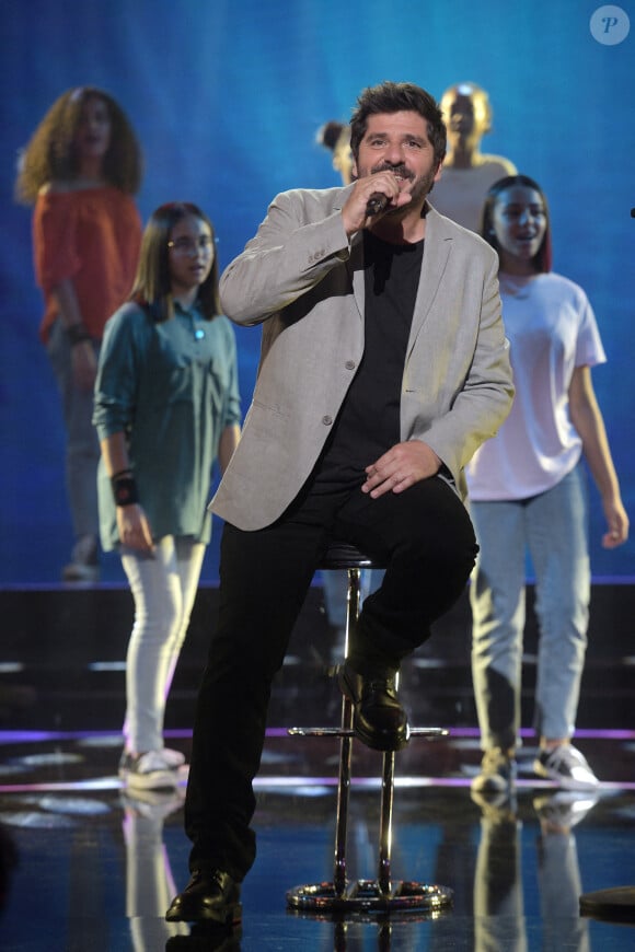 Exclusif - Patrick Fiori - Enregistrement de l'émission "300 Choeurs chantent Dassin" à Paris, qui sera diffusée le 16 octobre sur France 3. Le divertissement musical "300 Choeurs" fait sa rentrée avec une émission 100 % inédite consacrée à l'un des artistes les plus populaires dans les années 70, Joe Dassin. Toute la soirée, plusieurs générations d'artistes s'associeront aux plus beaux choeurs français pour reprendre à leurs côtés les plus grandes chansons de du chanteur dans des versions créées spécialement pour l'émission. Le 15 septembre 2020 © Tiziano Da Silva / Bestimage 