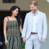 Le prince Harry, duc de Sussex, et Meghan Markle, duchesse de Sussex, lors d'une réception dans les jardins de la résidence du haut-commissaire britannique au Cap, Afrique du Sud.