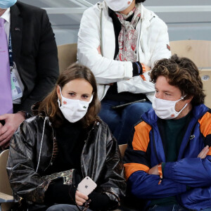 Jean Imbert et une amie assistent à la finale simple homme des internationaux de tennis de Roland Garros, opposant Rafael Nadal à Novak Djokovic. Paris, le 11 octobre 2020. © Dominique Jacovides / Bestimage