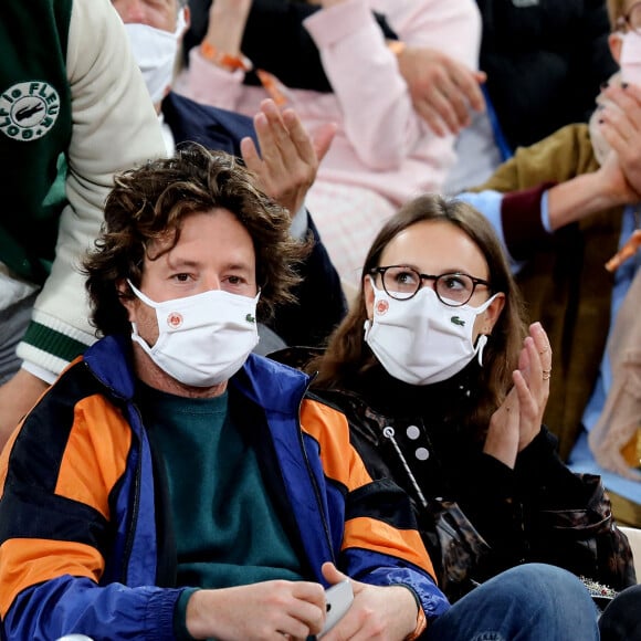 Jean Imbert et une amie assistent à la finale simple homme des internationaux de tennis de Roland Garros, opposant Rafael Nadal à Novak Djokovic. Paris, le 11 octobre 2020. © Dominique Jacovides / Bestimage