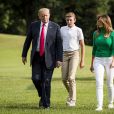 Le président Donald Trump, sa femme la Première Dame Melania Trump et leur fils Barron rentre à la Maison Blanche à Washington, The District, Etats-Unis, le 19 août 2018, après un week-end à Bedminster dans le New Jersey.   