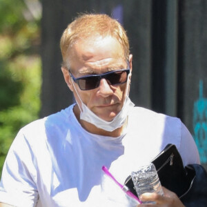 Exclusif - Jean-Claude Van Damme (JCVD) se rend chez le dentiste après son cours de sport à Los Angeles, le 7 juillet 2020