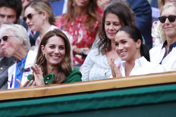 Catherine (Kate) Middleton, duchesse de Cambridge, Meghan Markle, duchesse de Sussex, et Pippa Middleton dans les tribunes lors de la finale femme de Wimbledon "Serena Williams - Simona Halep (2/6 - 2/6) à Londres, le 13 juillet 2019.