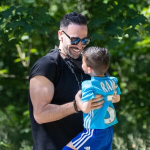 Adil Rami se promène avec son fils, Paris May 30, 2020.