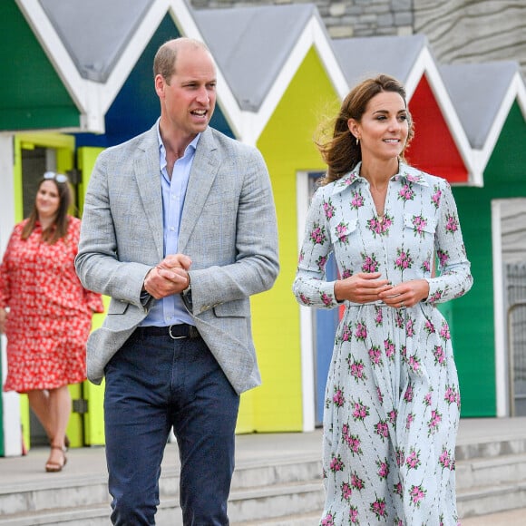 Le prince William, duc de Cambridge, et Kate Middleton, duchesse de Cambridge, lors de leur visite à "Island Leisure Amusement Arcade" à Barry (Royaume-Uni), le 4 août 2020.