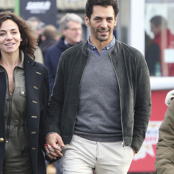 Tomer Sisley et sa femme Sandra lors de la 100ème édition du Grand Prix d'Amérique sur l'hippodrome de Vincennes à Paris, France, le 26 janvier 2020 © Michael Baucher / Panoramic / Bestimage