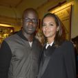 Lilian Thuram et Karine Le Marchand - Soiree de Gala pour l'association "Un Coeur Pour la Paix " a l'occasion du spectacle d'Ary Abittan au Theatre Edouard VII a Paris le 24 juin 2013.