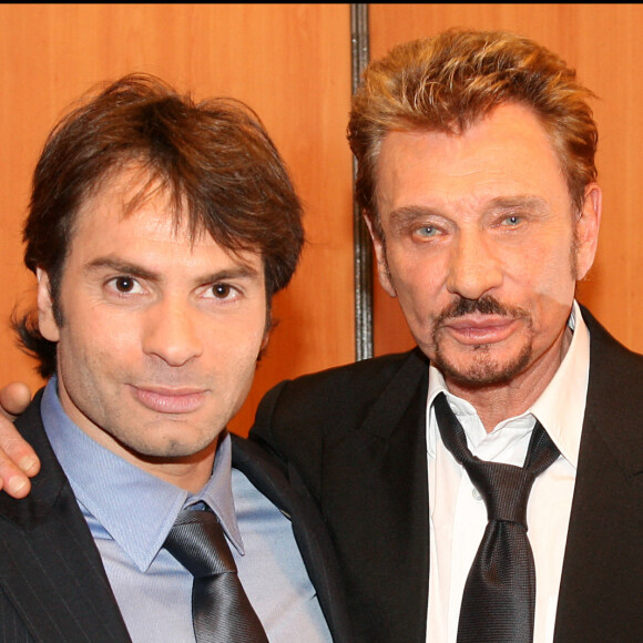 Christophe Dominici et Johnny Hallyday - Backstages de la cérémonie des NRJ Music Awards 2008 au Palais des festivals de Cannes.