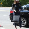 Laverne Cox porte un sac Christian Dior - Arrivée des célébrités à la fête InStyle Day of Indulgence dans le quartier de Brentwood à Los Angeles, le 11 août 2019.