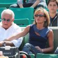 Dominique Strauss Kahn et sa compagne Myriam L'Aouffir dans les tribunes des Internationaux de France de tennis de Roland Garros le 30 mai 2015.   