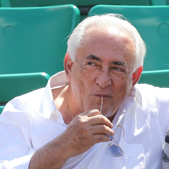 Dominique Strauss Kahn et sa compagne Myriam L'Aouffir assistent aux Internationaux de France de tennis de Roland Garros le 30 mai 2015. 