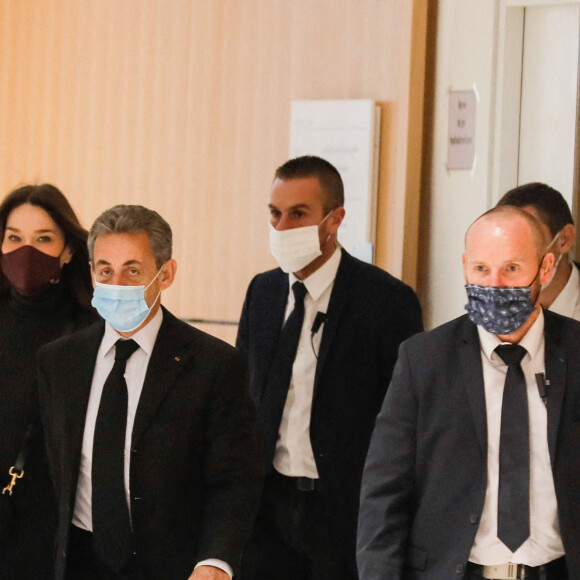 1er jour des plaidoiries de la défense - Nicolas Sarkozy arrive avec sa femme Carla Bruni Sarkozy procès des "écoutes téléphoniques" ( affaire Bismuth) au tribunal de Paris le 9 décembre 2020. © Christophe Clovis / Bestimage 