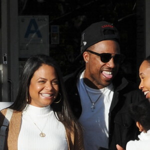 Christina Milian, enceinte, dans une robe moulante blanche à la sortie de chez Fred Segal's avec son compagnon Matt Pokora et sa fille, Violet Madison Nash, après avoir déjeuné avec des amis, à Los Angeles, Californie, Etats-Unis, le 7 janvier 2020. 