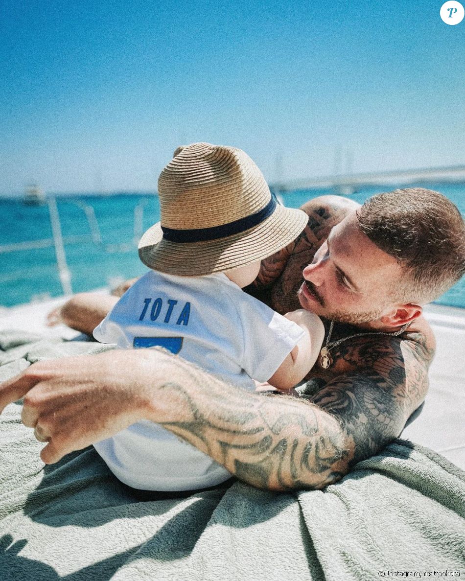 M. Pokora et son fils Isaiah lors de vacances en France le 12 juillet 2020.