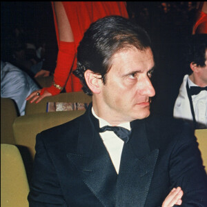 Pierre Lescure et Catherine Deneuve lors de la cérémonie des César en 1985.