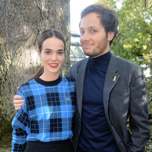 Vianney Bureau (Vianney), sa compagne Catherine Robert - People au défilé Lacoste Collection Prêt-à-Porter Printemps/Eté 2020 lors de la Fashion Week de Paris, le 1er octobre 2019. © Veeren Ramsamy-Christophe Clovis/Bestimage 