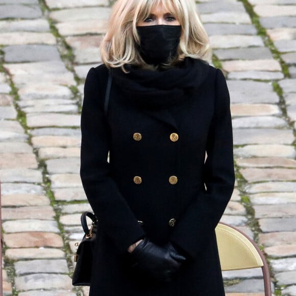 Le président de la république, Emmanuel Macron accompagné de la première dame Brigitte Macron lors de l'hommage national rendu à Daniel Cordier aux Invalides, à Paris le 26 novembre 2020, Paris. © Stéphane Lemouton / Bestimage 