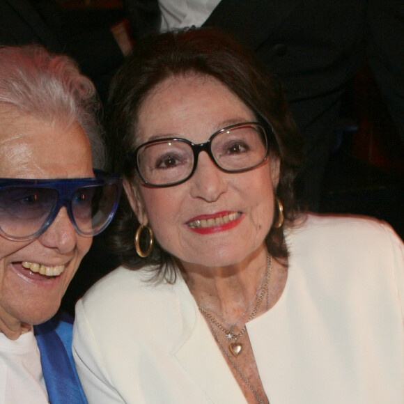 Michou et Nana Mouskouri - Michou fête son 88e anniversaire dans son cabaret avec ses amis à Paris le 18 juin 2019. © JLPPA/Bestimage