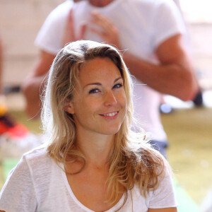 Aurélie Vaneck - "Mécénat Chirurgie Cardiaque" a organisé "Les Yogis du coeur", séance de yoga collective 100 % solidaire, accessible à tous afin de venir en aide aux enfants atteints de cardiopathie. 700 personnes étaient réunies à l'Orangerie du Château de Versailles le 21 septembre 2014.